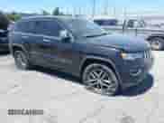 2018 Jeep Grand Cherokee Limited z VIN 1C4RJEBG5JC512008, wystawiony jako IAAI lot #42897081 z przebiegiem 141 938 mil mil oraz . Historia ofert i sprzedaży dostępna na DreamBid. Obrazek 1.