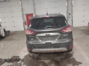 ✅ 2015 Ford Escape Titanium • VIN: 1FMCU9JX5FUA35888 • Lot: 41209408. Listed on IAAI with 125,378 mi. Free auction sales archive from the USA and detailed vehicle history report at DreamBid. Image 16.