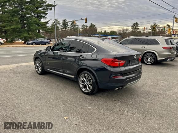 ✅ 2016 BMW X4 xDrive28i • VIN: 5UXXW3C59G0R21860 • Lot: 94803765. Listed on Copart with 178,189 mi. Free auction sales archive from the USA and detailed vehicle history report at DreamBid. Image 3.