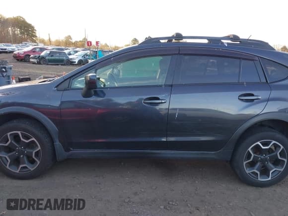 ✅ 2013 Subaru Crosstrek Premium • VIN: JF2GPACCXD2857038 • Lot: 43865463. Listed on IAAI with 153,805 mi. Free auction sales archive from the USA and detailed vehicle history report at DreamBid. Image 14.