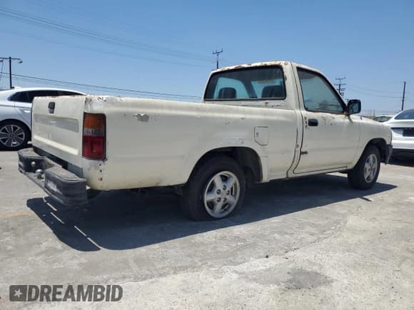 ✅ 1990 Toyota Pickup • VIN: JT4RN81A9L5071980 • Lot: 63795355. Wystawiony na Copart z przebiegiem 189 781 mil. Bezpłatny archiwum sprzedaży aukcyjnych z USA i szczegółowy raport historii pojazdu na DreamBid. Zdjęcie 3.
