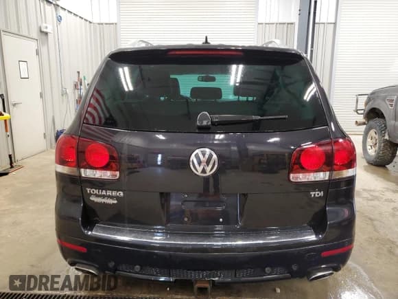 ✅ 2010 Volkswagen Touareg • VIN: WVGAK7A98AD002461 • Лот: 50265945. Опубликован ранее на Copart с пробегом 166 315 миль. Бесплатный доступ к архиву аукционных продаж из США и подробный отчёт об истории автомобиля на DreamBid. Изображение 6.