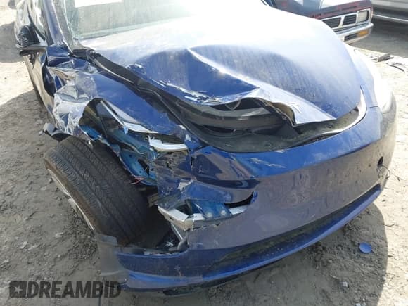 ✅ 2023 Tesla Model Y Long Range • VIN: 7SAYGDEE3PA033533 • Lot: 41933287. Listed on IAAI with 35,364 mi. Free auction sales archive from the USA and detailed vehicle history report at DreamBid. Image 6.