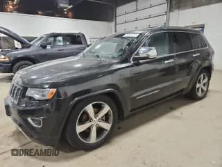 ✅ 2014 Jeep Grand Cherokee Overland • VIN: 1C4RJFCG9EC339863 • Lot: 90741315. Listed on Copart with 143,485 mi. Free auction sales archive from the USA and detailed vehicle history report at DreamBid. Image 1.
