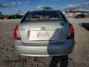 2010 Hyundai Accent GLS z VIN KMHCN4AC9AU454204, wystawiony jako Copart lot #81687474 z przebiegiem 158 745 mil mil oraz Szkoda całkowita • Salvage title. Historia ofert i sprzedaży dostępna na DreamBid. Obrazek 6.