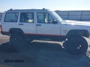 ✅ 1995 Jeep Cherokee Sport • VIN: 1J4FJ68S1SL576255 • Lot: 42178902. Listed on IAAI with 214,041 mi. Free auction sales archive from the USA and detailed vehicle history report at DreamBid. Image 13.