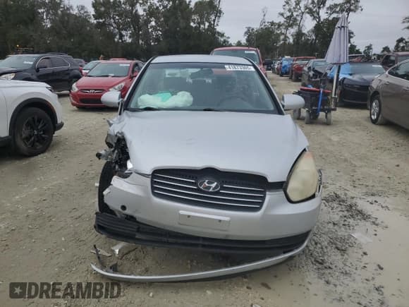 ✅ 2006 Hyundai Accent GLS • VIN: KMHCN46C06U047601 • Лот: 41873365. Опубликован ранее на Copart с пробегом 163 812 миль. Бесплатный доступ к архиву аукционных продаж из США и подробный отчёт об истории автомобиля на DreamBid. Изображение 5.