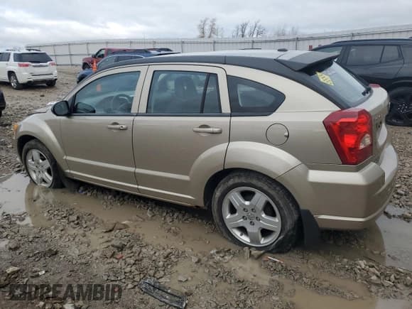 ✅ 2009 Dodge Caliber SXT • VIN: 1B3HB48AX9D259703 • Лот: 80551064. Опубликован ранее на Copart с пробегом 128 818 миль. Бесплатный доступ к архиву аукционных продаж из США и подробный отчёт об истории автомобиля на DreamBid. Изображение 2.