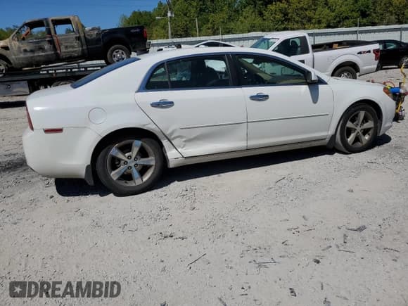 ✅ 2012 Chevrolet Malibu 1LT • VIN: 1G1ZC5E02CF211828 • Lot: 70133244. Listed on Copart with 115,572 mi. Free auction sales archive from the USA and detailed vehicle history report at DreamBid. Image 3.