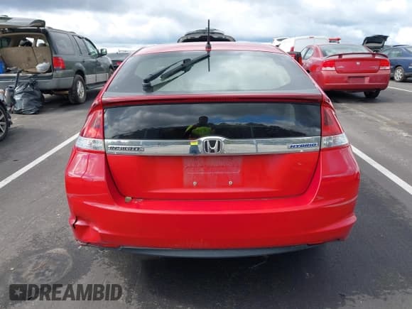 ✅ 2013 Honda Insight • VIN: JHMZE2H30DS003797 • Lot: 43580287. Listed on IAAI with 104,858 mi. Free auction sales archive from the USA and detailed vehicle history report at DreamBid. Image 16.