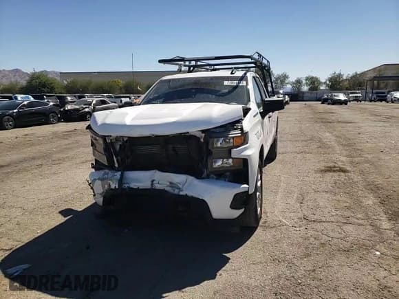 ✅ 2020 Chevrolet Silverado 1500 Custom • VIN: 1GCRWBEF1LZ102082 • Lot: 73054144. Wystawiony na Copart z przebiegiem 63 443 mil. Bezpłatny archiwum sprzedaży aukcyjnych z USA i szczegółowy raport historii pojazdu na DreamBid. Zdjęcie 10.