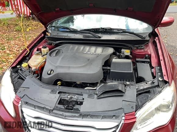 ✅ 2012 Chrysler 200 Touring • VIN: 1C3CCBBG4CN199415 • Лот: 89870865. Опубликован ранее на Copart с пробегом 126 490 миль. Бесплатный доступ к архиву аукционных продаж из США и подробный отчёт об истории автомобиля на DreamBid. Изображение 7.