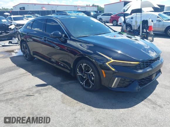 ✅ 2025 Kia K5 GT-Line • VIN: KNAG64J72S5286162 • Lot: 42530210. Listed on IAAI with 15,720 mi. Free auction sales archive from the USA and detailed vehicle history report at DreamBid. Image 1.