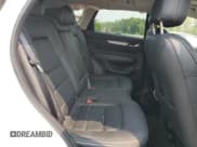 ✅ 2024 Mazda CX-5 S Premium • VIN: JM3KFBDL1R0444628 • Лот: 67497625. Опубликован ранее на Copart с пробегом 25 121 миль. Бесплатный доступ к архиву аукционных продаж из США и подробный отчёт об истории автомобиля на DreamBid. Изображение 11.