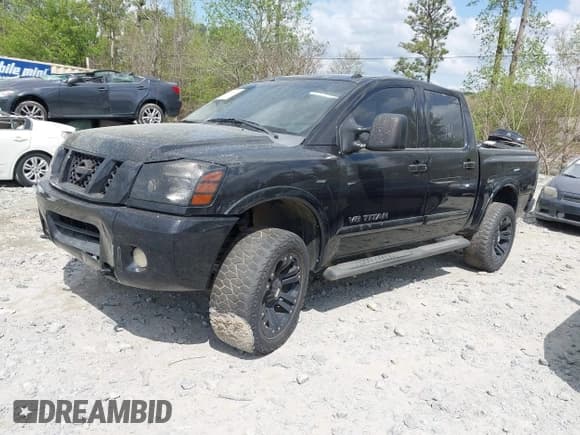 ✅ 2009 Nissan Titan LE • VIN: 1N6BA07D79N317253 • Lot: 41944642. Listed on IAAI with 231,896 mi. Free auction sales archive from the USA and detailed vehicle history report at DreamBid. Image 2.