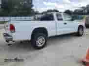 2003 Dodge Dakota SLT z VIN 1D7HL42XX3S333865, wystawiony jako Copart lot #73509404 z przebiegiem 123 515 mil mil oraz Szkoda całkowita • Salvage title. Historia ofert i sprzedaży dostępna na DreamBid. Obrazek 3.
