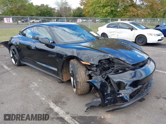 ✅ 2023 Porsche Taycan • VIN: WP0AA2Y11PSA10225 • Lot: 43414419. Listed on IAAI with 28,292 mi. Free auction sales archive from the USA and detailed vehicle history report at DreamBid. Image 1.