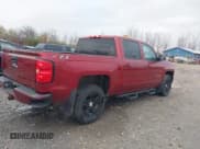 ✅ 2018 Chevrolet Silverado 1500 LT • VIN: 3GCUKREC6JG585828 • Lot: 43659037. Listed on IAAI with 130,703 mi. Free auction sales archive from the USA and detailed vehicle history report at DreamBid. Image 4.