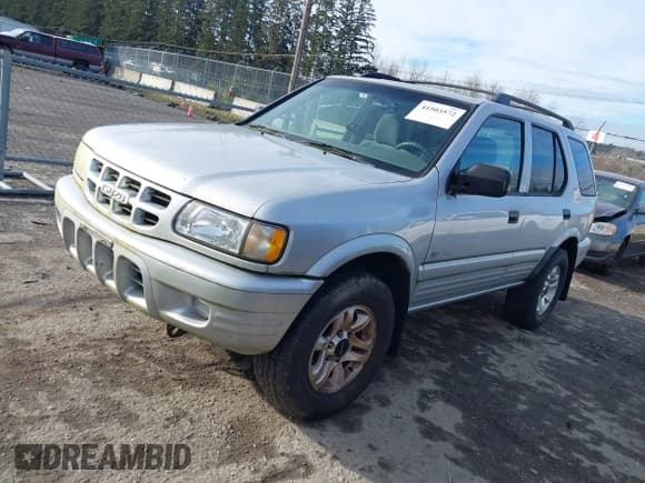 ✅ 2002 Isuzu Rodeo • VIN: 4S2DM58W924321403 • Лот: 41503572. Опубликован ранее на IAAI с пробегом 235 072 миль. Бесплатный доступ к архиву аукционных продаж из США и подробный отчёт об истории автомобиля на DreamBid. Изображение 2.