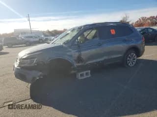 ✅ 2020 Volkswagen Tiguan S • VIN: 3VV0B7AX9LM144292 • Lot: 90301325. Listed on Copart with 99,999 mi. Free auction sales archive from the USA and detailed vehicle history report at DreamBid. Image 1.