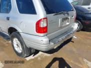 ✅ 2002 Isuzu Rodeo S • VIN: 4S2CK58WX24321556 • Lot: 41405981. Listed on IAAI with 172,590 mi. Free auction sales archive from the USA and detailed vehicle history report at DreamBid. Image 6.