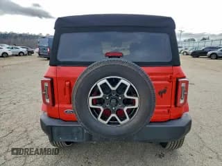 ✅ 2022 Ford Bronco • VIN: 1FMDE5DH7NLA98557 • Лот: 93811005. Опубликован ранее на Copart с пробегом 61 743 миль. Бесплатный доступ к архиву аукционных продаж из США и подробный отчёт об истории автомобиля на DreamBid. Изображение 6.