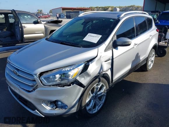 ✅ 2019 Ford Escape Titanium • VIN: 1FMCU0J98KUB77742 • Лот: 43666977. Опубликован ранее на IAAI с пробегом 117 793 миль. Бесплатный доступ к архиву аукционных продаж из США и подробный отчёт об истории автомобиля на DreamBid. Изображение 6.