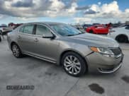 ✅ 2015 Lincoln MKS • VIN: 1LNHL9EK0FG606676 • Lot: 92029925. Listed on Copart with 79,333 mi. Free auction sales archive from the USA and detailed vehicle history report at DreamBid. Image 4.