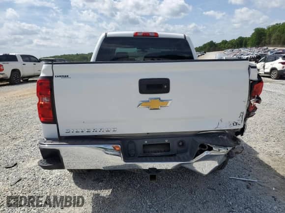 2018 Chevrolet Silverado 1500 LT с VIN 3GCUKREC7JG489299, выставлен на аукционе Copart как лот 53777255 с пробегом 50 384 миль миль и Списание • Salvage title. История ставок и продаж доступна на DreamBid. Изображение 6.