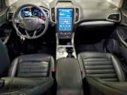 ✅ 2021 Ford Edge SEL • VIN: 2FMPK4J96MBA61785 • Lot: 94808185. Wystawiony na Copart z przebiegiem 107 382 mil. Bezpłatny archiwum sprzedaży aukcyjnych z USA i szczegółowy raport historii pojazdu na DreamBid. Zdjęcie 8.
