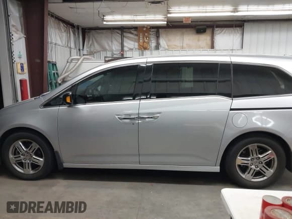 ✅ 2012 Honda Odyssey Touring • VIN: 5FNRL5H90CB004537 • Lot: 43184321. Listed on IAAI with 132,469 mi. Free auction sales archive from the USA and detailed vehicle history report at DreamBid. Image 14.