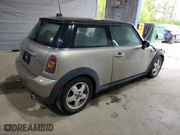 2010 MINI Hardtop with VIN WMWMF3C50ATZ66791, listed as a Copart auction lot 57592875 with Not provided miles and Salvage title. Bid and sale history available at DreamBid. Image 3.