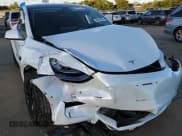 ✅ 2022 Tesla Model Y Performance • VIN: 7SAYGDEF5NF393220 • Lot: 90219035. Listed on Copart with 31,252 mi. Free auction sales archive from the USA and detailed vehicle history report at DreamBid. Image 13.