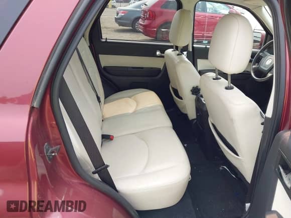 2010 Mercury Mariner Premier with VIN 4M2CN9HG2AKJ12271, listed as a IAAI auction lot 42896746 with 229,869 mi miles and . Bid and sale history available at DreamBid. Image 8.