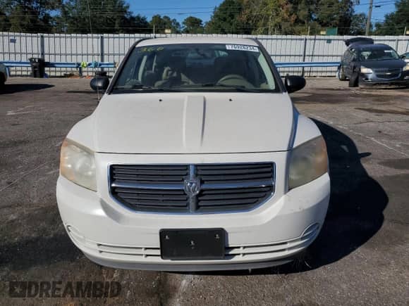 2007 Dodge Caliber SXT with VIN 1B3JB48B07D502636, listed as a Copart auction lot 76928234 with 67,542 mi miles and Salvage title. Bid and sale history available at DreamBid. Image 5.
