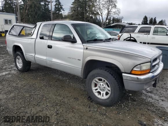 ✅ 2002 Dodge Dakota SLT • VIN: 1B7GG42N12S622088 • Lot: 50834805. Wystawiony na Copart z przebiegiem 173 493 mil. Bezpłatny archiwum sprzedaży aukcyjnych z USA i szczegółowy raport historii pojazdu na DreamBid. Zdjęcie 4.