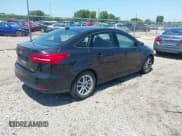 ✅ 2015 Ford Focus SE • VIN: 1FADP3F27FL216870 • Lot: 42375299. Listed on IAAI with 125,202 mi. Free auction sales archive from the USA and detailed vehicle history report at DreamBid. Image 4.