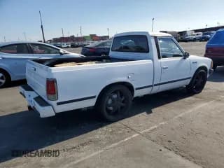 ✅ 1986 Nissan 720 • VIN: JN6ND01S6GW128919 • Lot: 80551334. Wystawiony na Copart z przebiegiem 158 914 mil. Bezpłatny archiwum sprzedaży aukcyjnych z USA i szczegółowy raport historii pojazdu na DreamBid. Zdjęcie 3.