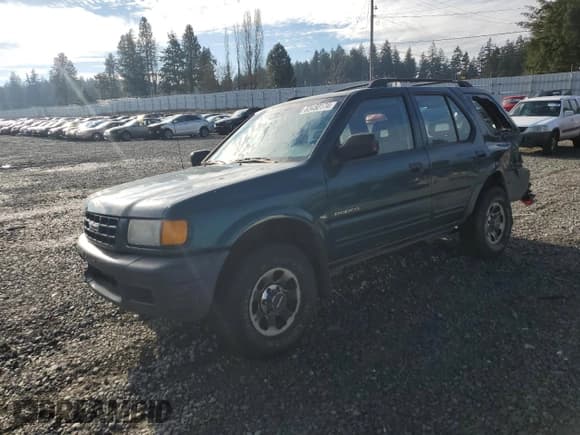 ✅ 1999 Isuzu Rodeo S • VIN: 4S2CM58W7X4359649 • Lot: 83450174. Listed on Copart with 171,940 mi. Free auction sales archive from the USA and detailed vehicle history report at DreamBid. Image 1.