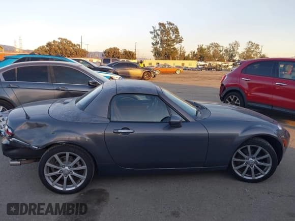 ✅ 2007 Mazda MX-5 Miata Grand Touring • VIN: JM1NC26F870126010 • Lot: 43847751. Listed on IAAI with 171,868 mi. Free auction sales archive from the USA and detailed vehicle history report at DreamBid. Image 13.