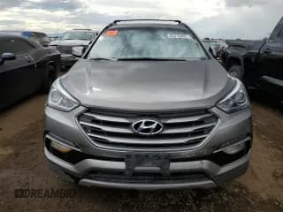 ✅ 2018 Hyundai Santa Fe 2.4L • VIN: 5NMZUDLB4JH067122 • Лот: 63310903. Опубликован ранее на Copart с пробегом 88 561 миль. Бесплатный доступ к архиву аукционных продаж из США и подробный отчёт об истории автомобиля на DreamBid. Изображение 5.