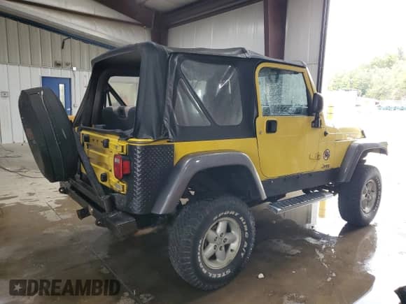 2004 Jeep Wrangler X with VIN 1J4FA39S24P739178, listed as a Copart auction lot 82471315 with 156,568 mi miles and Clean title. Bid and sale history available at DreamBid. Image 3.