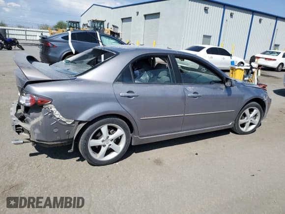 ✅ 2006 Mazda 6 i • VIN: 1YVHP80C665M10394 • Lot: 46084005. Listed on Copart with 215,913 mi. Free auction sales archive from the USA and detailed vehicle history report at DreamBid. Image 3.