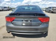 ✅ 2014 Audi A7 Premium • VIN: WAU3GCFC2EN076824 • Lot: 70535355. Wystawiony na Copart z przebiegiem 88 929 mil. Bezpłatny archiwum sprzedaży aukcyjnych z USA i szczegółowy raport historii pojazdu na DreamBid. Zdjęcie 6.