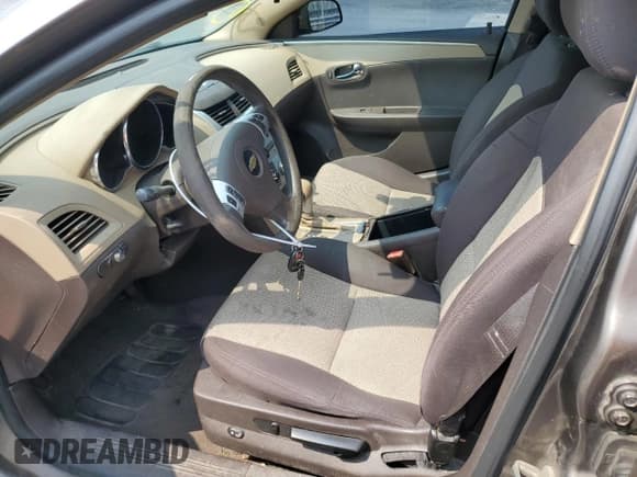 ✅ 2012 Chevrolet Malibu 1LS • VIN: 1G1ZB5E05CF316317 • Lot: 59702495. Listed on Copart with 137,824 mi. Free auction sales archive from the USA and detailed vehicle history report at DreamBid. Image 7.