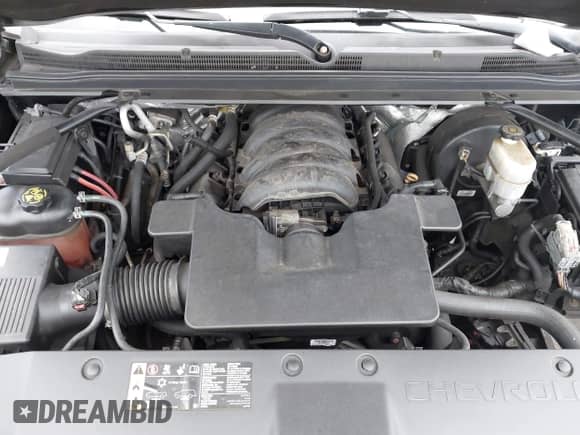 2018 Chevrolet Suburban LS z VIN 1GNSKGKCXJR264351, wystawiony jako IAAI lot #42365399 z przebiegiem 69 704 mil mil oraz . Historia ofert i sprzedaży dostępna na DreamBid. Obrazek 10.