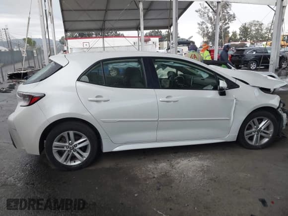 ✅ 2020 Toyota Corolla SE • VIN: JTND4RBE7L3077563 • Lot: 43246493. Listed on IAAI with 101,697 mi. Free auction sales archive from the USA and detailed vehicle history report at DreamBid. Image 14.