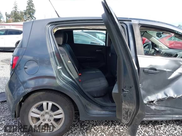 2013 Chevrolet Sonic LT with VIN 1G1JC6SG2D4148084, listed as a IAAI auction lot 43459236 with 94,963 mi miles and . Bid and sale history available at DreamBid. Image 8.