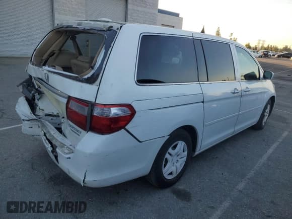 ✅ 2005 Honda Odyssey Touring • VIN: 5FNRL38865B017422 • Lot: 90631125. Listed on Copart with 158,365 mi. Free auction sales archive from the USA and detailed vehicle history report at DreamBid. Image 3.