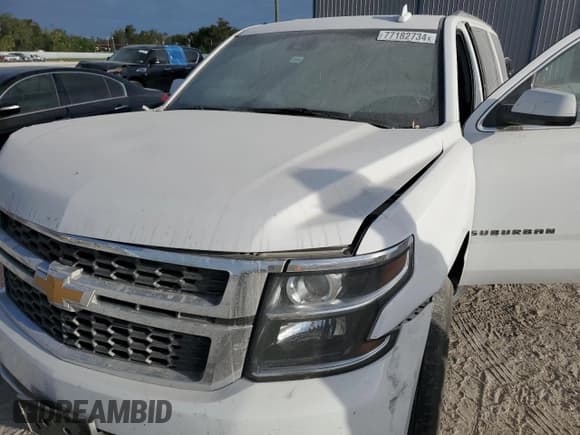 ✅ 2020 Chevrolet Suburban LT • VIN: 1GNSKHKC6LR243991 • Lot: 77182734. Wystawiony na Copart z przebiegiem Nie podano. Bezpłatny archiwum sprzedaży aukcyjnych z USA i szczegółowy raport historii pojazdu na DreamBid. Zdjęcie 14.